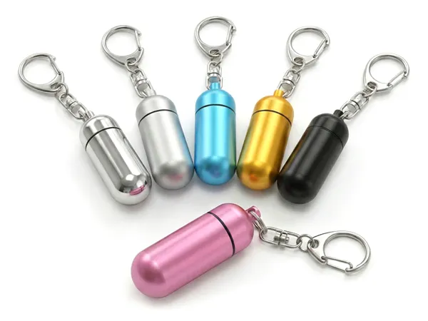 アンケートと写真投稿にご協力していただいたお礼カプセル型キーホルダーをお渡し